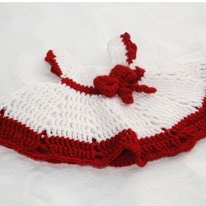 Handmade, crocheted baby dress